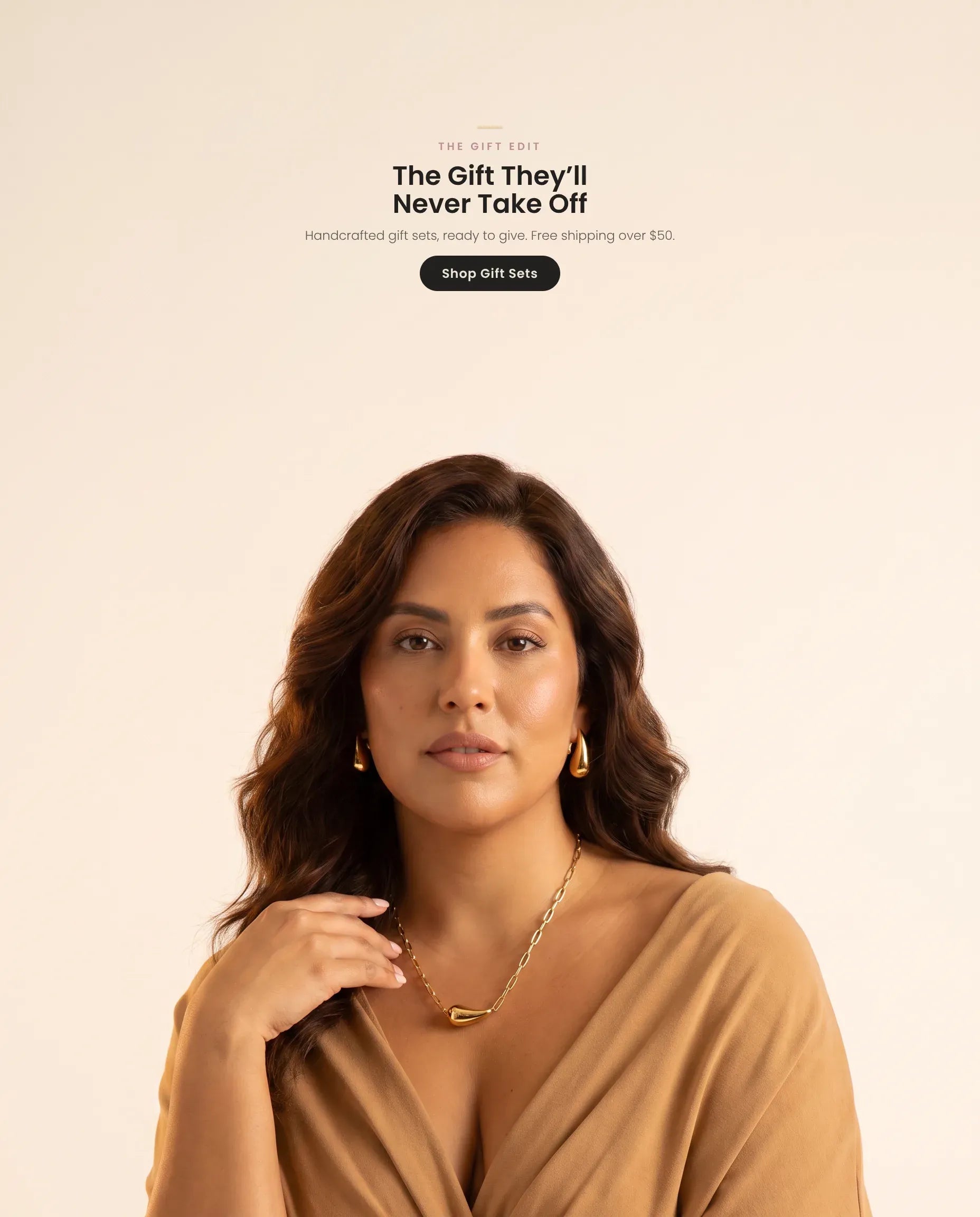 Homepage hero banner (mobile, web-optimized, crop-safe v3) — model wearing the Golden Raindrop necklace and earrings gift set