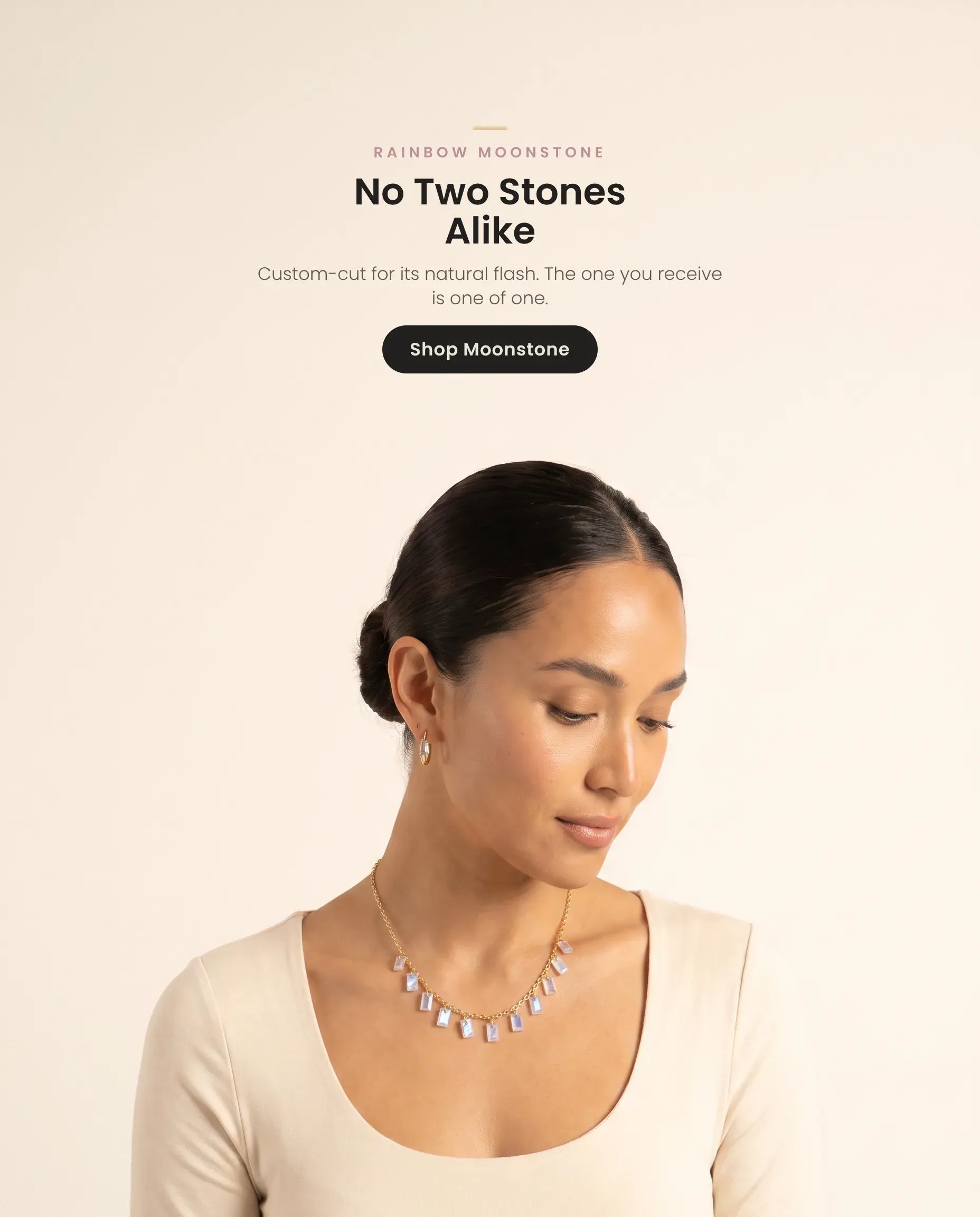 Homepage hero banner (mobile, web-optimized, crop-safe, large type) — model wearing the Baguette Charms rainbow moonstone necklace